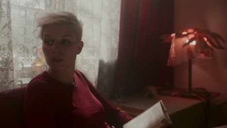 woman reading at home
