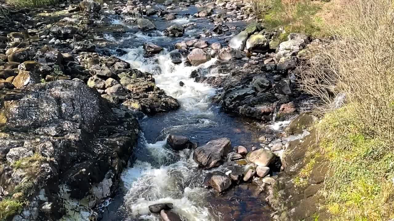 Static Slow Motion Shot of A Small River, Scotland