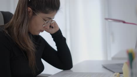 woman studying at desk