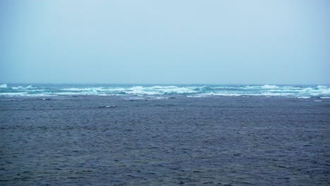 waves breaking in winter storm in northern hokkaido