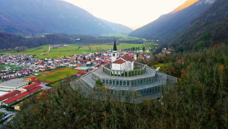 Aerial-4K-drone-footage-captures-the-majestic-Church-of-Saint-Anthony,-Kobarid--Slovenia