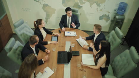 Business Team Mates Working Together. Creative business team meeting in office discussing new ideas