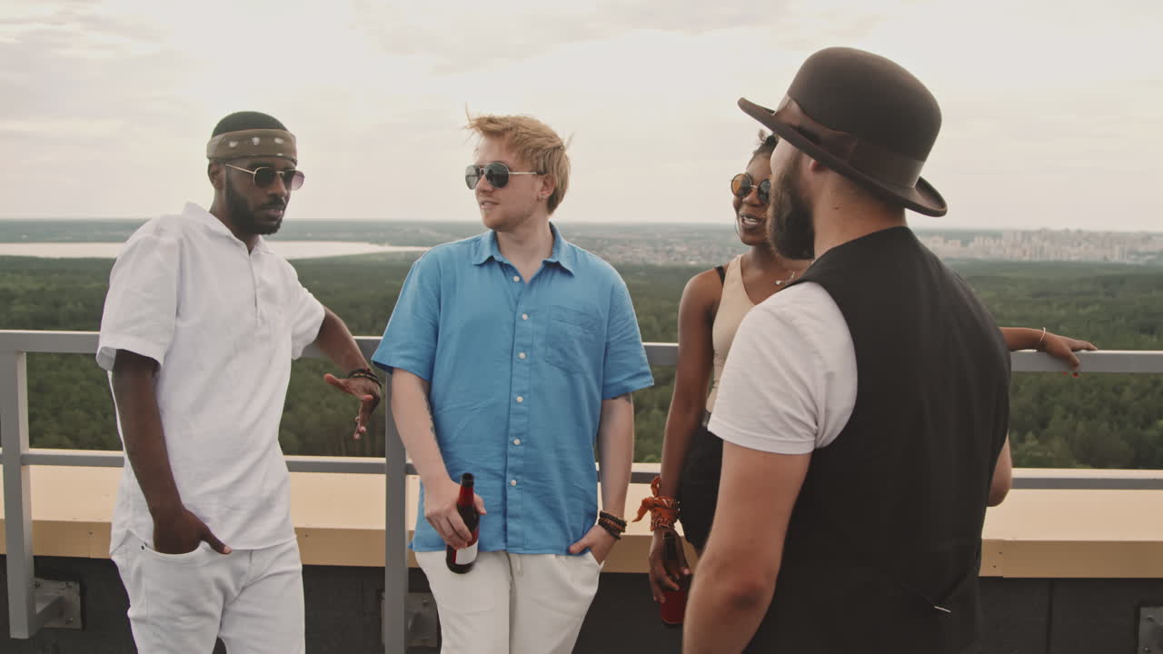 Friends Chatting at Rooftop Party
