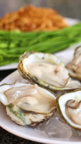 fresh oysters with traditional thai accompaniments