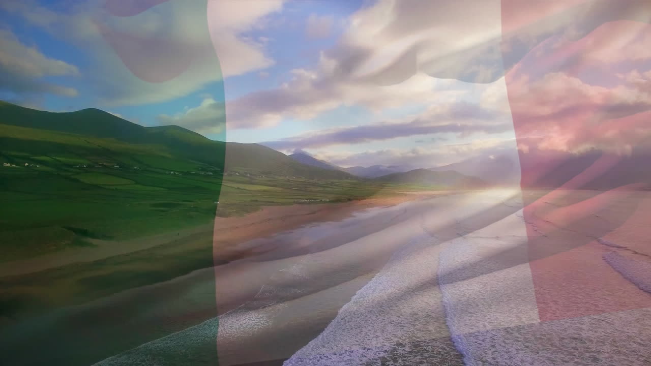 Animazione della bandiera dell'Italia che sventola su un paesaggio costiero, il mare e un cielo blu nuvoloso.