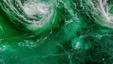 waves of water of the river and the sea meet each other during high tide and low tide.