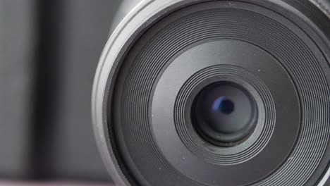 a black  mirrorless camera and lens on white background ,