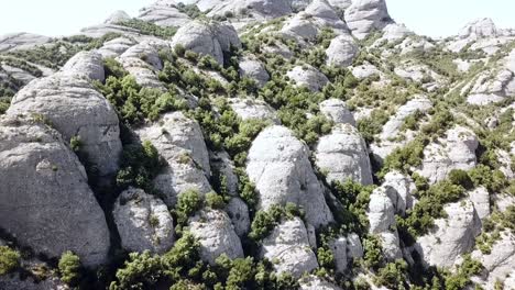 Aerial-view-of-the-Montserrat-mountains-near-Barcelona,-Catalonia,-Spain,-Europe