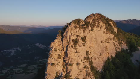 Right-Panning-Around-Granite-Rock-French-Alps-Down-Sunrise-Blue-Sky-Shadows-Mountains