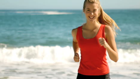 woman jogging on the beach