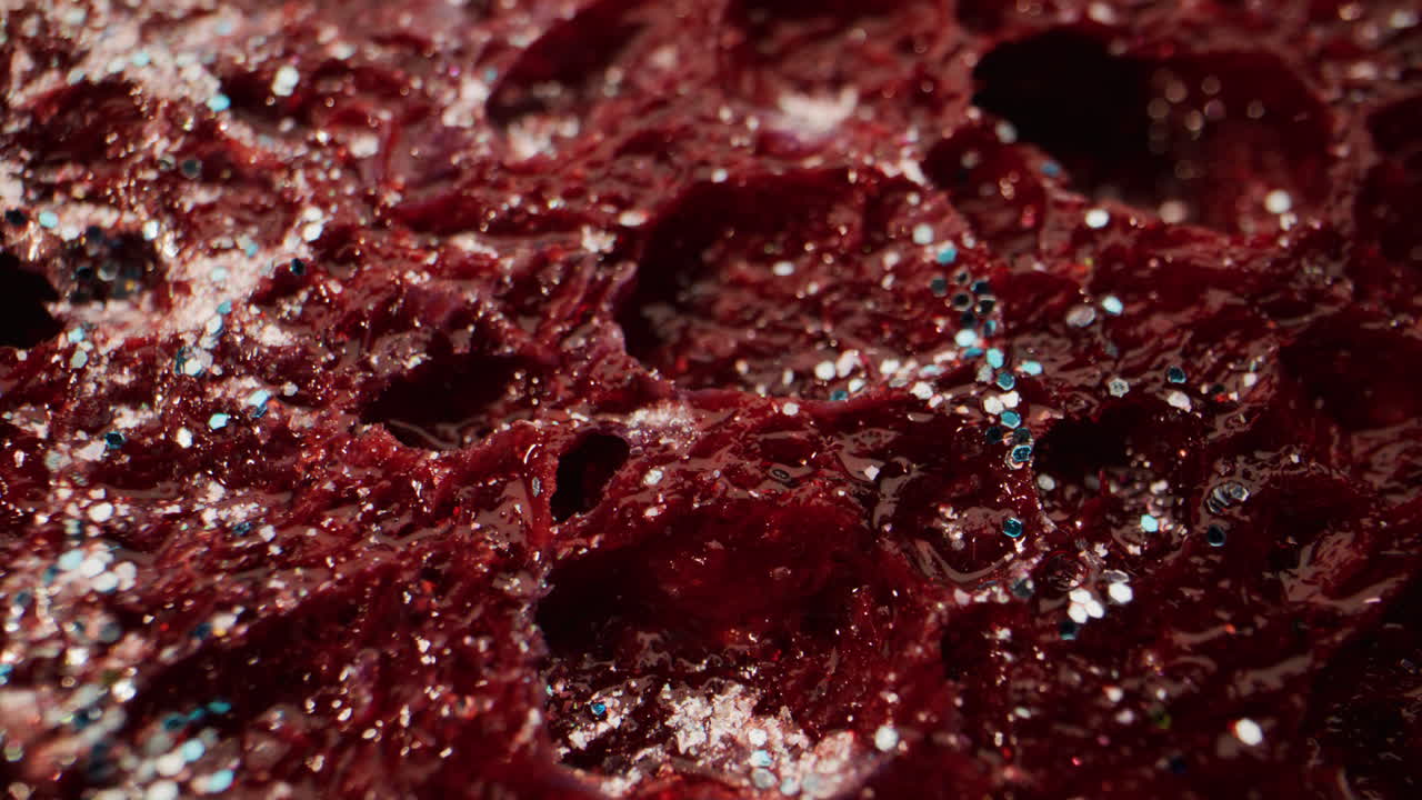 Close-up of Red Velvet Cake Texture with Glitter