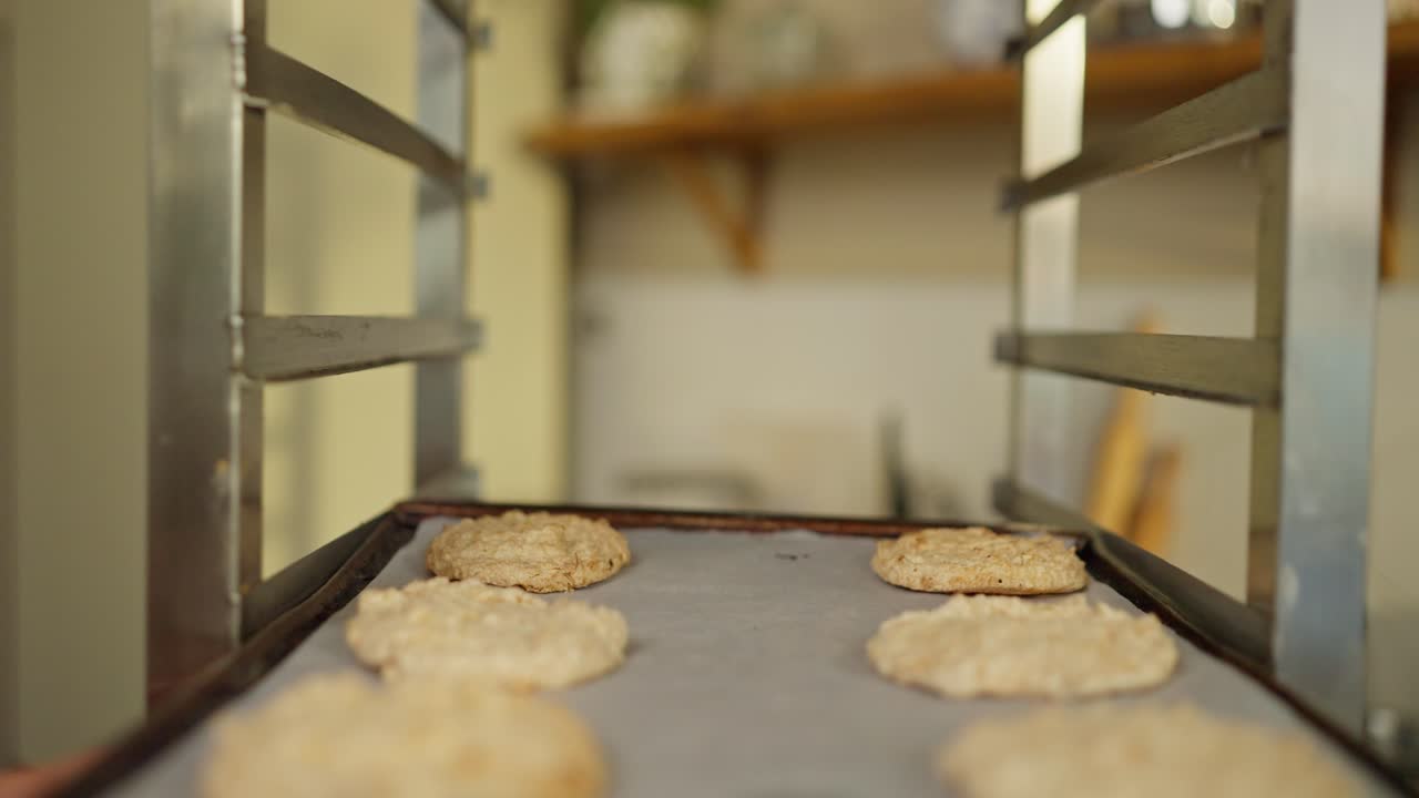 Close up of freshly baked oatmeal cookies on a baking sheet