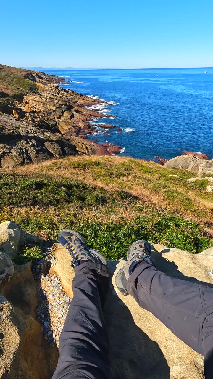 Relaxing Coastal View with Hiking Shoes