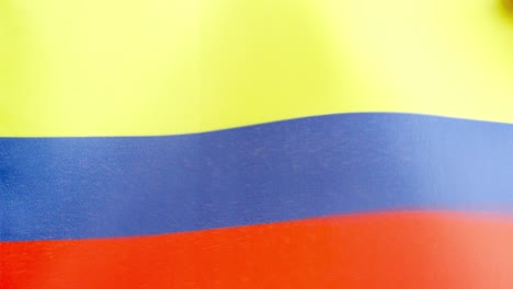 colombian national flag waving by the wind