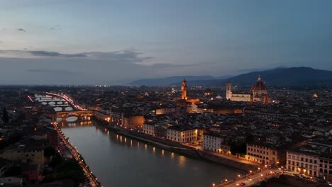beautiful aerial footage of florence-firenze (italy) at dusk. [drone movement: pitch forward]