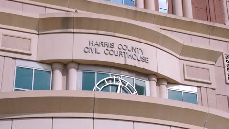 establishing shot of the harris county civil courthouse building