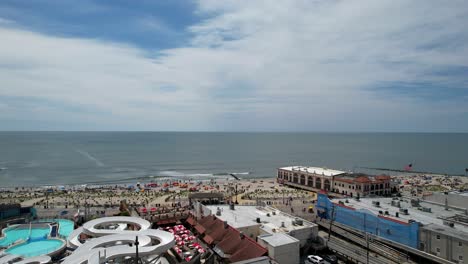 Flying-above-a-waterpark-on-the-Ocean-City,-New-Jersey-boardwalk