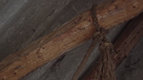 Hemp-Rope-Hanging-From-the-Top-Of-A-Barn-And-Pulled