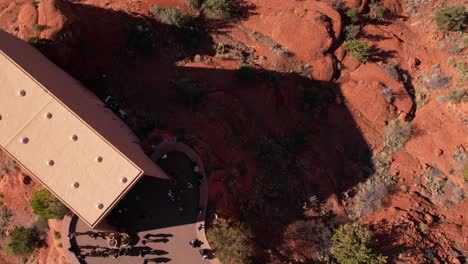 sedona, arizona usa. revealing drone shot of road traffic and landscape from chapel of holy cross