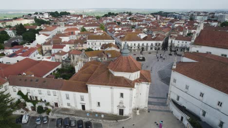 Drone-view-of-Santarem,-Portugal,-showcasing-the-Church-of-Nossa-Senhora-da-Piedade-with-surrounding-buildings