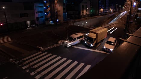 a night timelapse of the traffic jam at the city street in tokyo wide shot