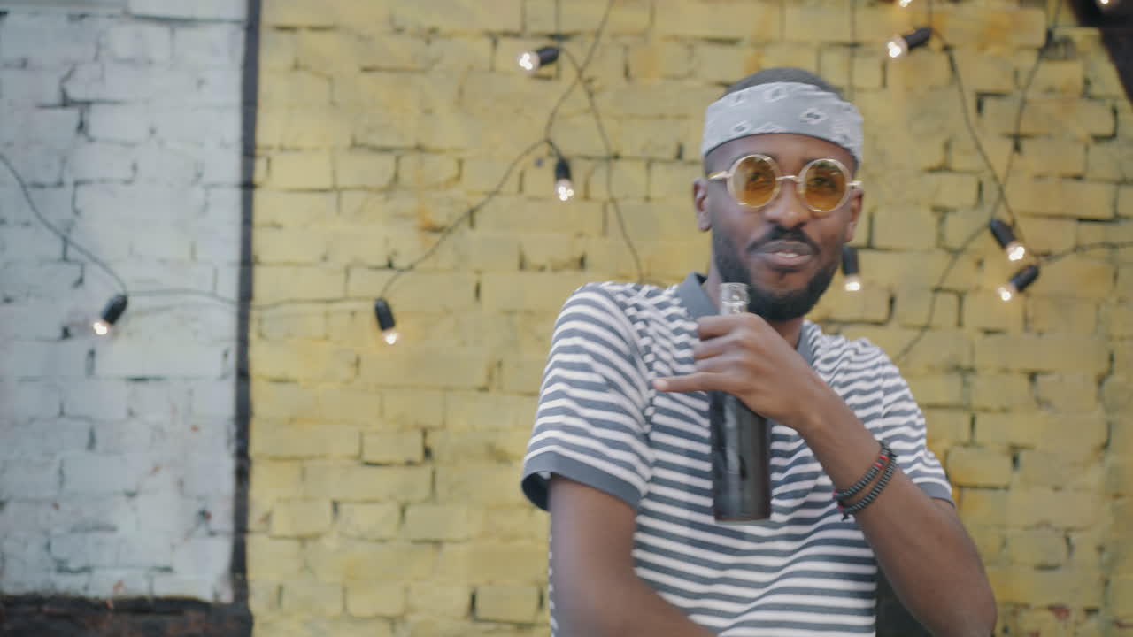 Happy Man Holding Bottle