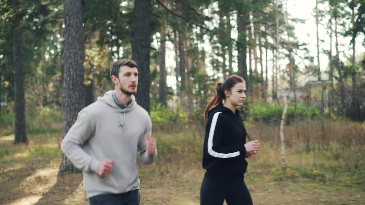 Couple Running in the Forest