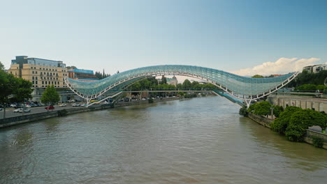 the bridge of peace spanning the kura river in tbilisi, georgia
