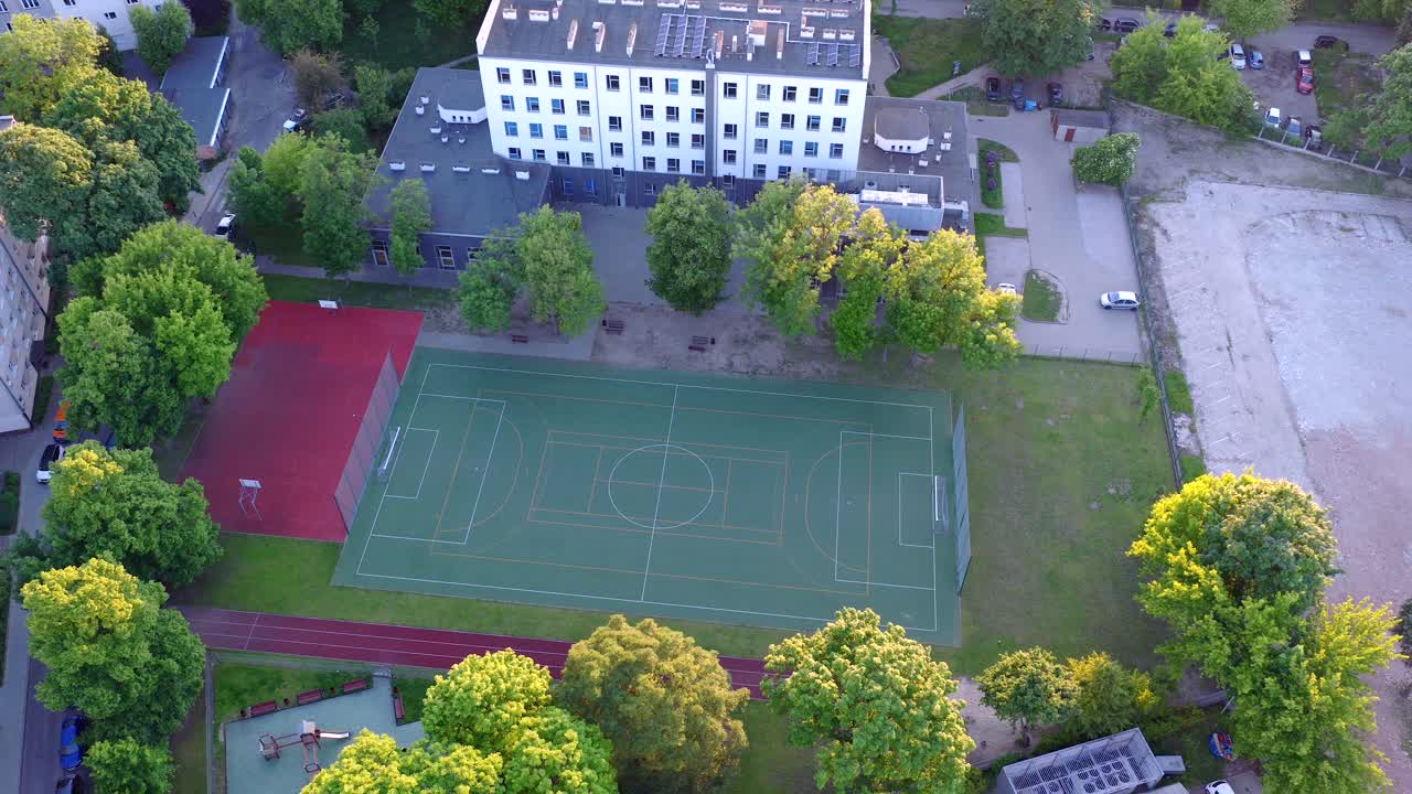 Residential buildings, sporting facilities, music school, aerial orbit