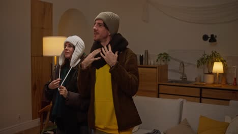 couple getting ready for winter