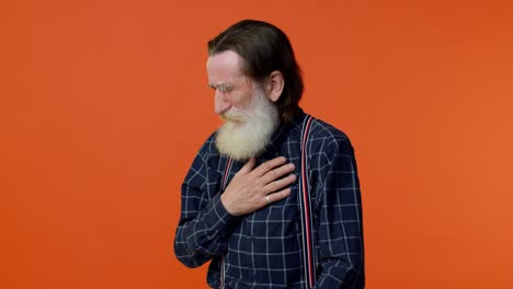unhealthy mature old bearded grandfather coughing covering mouth with hand, feeling sick, allergy