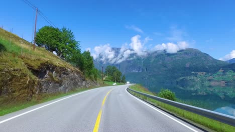 Driving-a-Car-on-a-Road-in-Norway