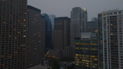 aerial descending shot of chicago skyline in usa during night