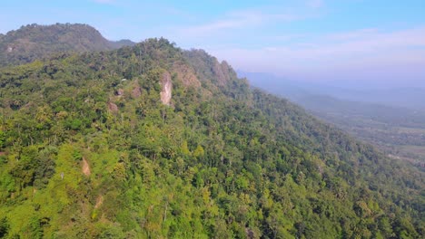 Cinematic-aerial-shot-of-an-endless-mountain-and-forest-landscape-in-south-east-asia