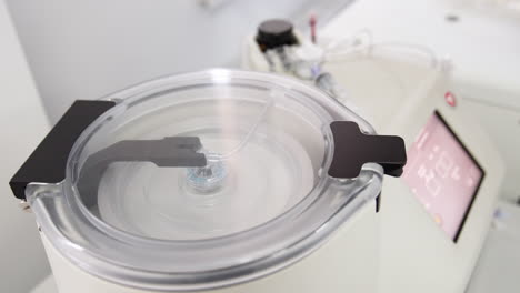 close look at the working centrifuge machine. medical equipment for plasma extraction. prp method.