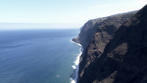 madeira ponto da pargo lighthouse aerial shot heading west