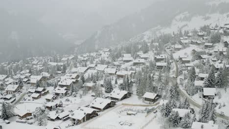 drone aerial of the beautiful resort and spa town verbier in the swiss alps