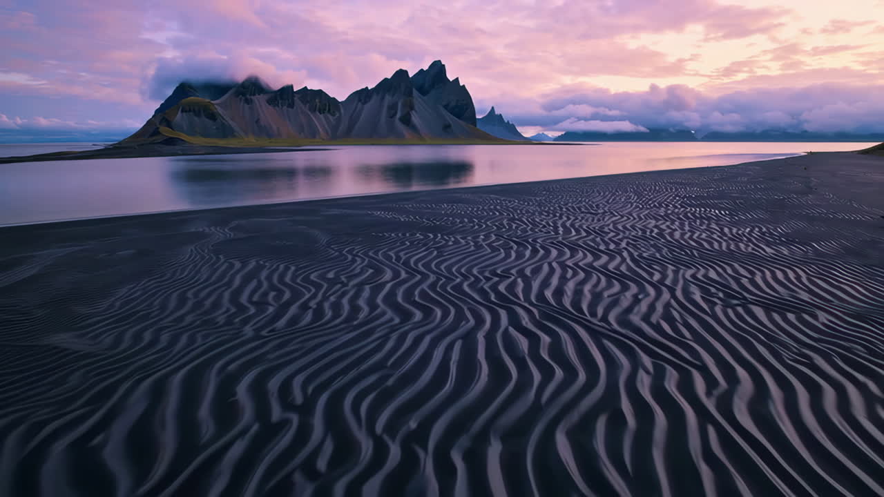 Dramatic Sunset over Vestrahorn Mountain and Black Sand Beach in Iceland