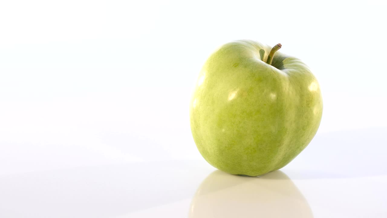 manzana verde, gira alrededor