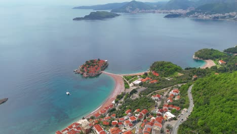 panoramic drone view of sveti stefan islet in montenegro with spring colors and medieval charm