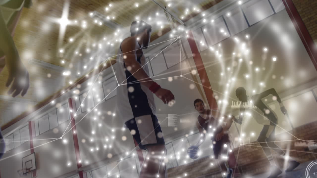 animación de un círculo hecho de luces sobre diversos jugadores de baloncesto masculinos en la cancha