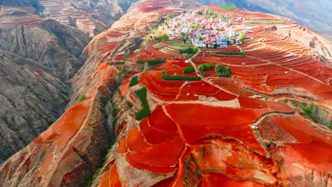 beautiful and natural panoramic view of large agricultural lands with corn, rice fields, wheat and sunflower fields and red mountains