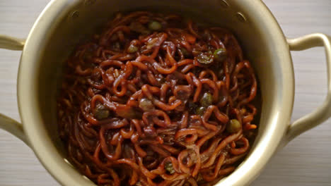 korean black spaghetti or instant noodle with roasted chajung soybean sauce - korean food style