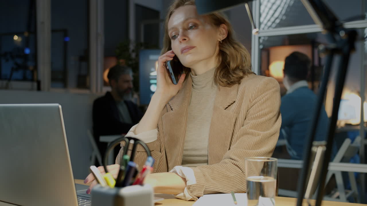 Business Woman Working Late in Office