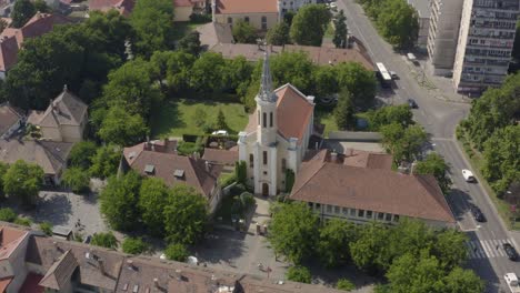 Cityscape-and-beutiful-Church-in-Vác-city,-Hungary-recorded-with-a-DJI-Mavic-2-pro-4K-UHD-30-fps