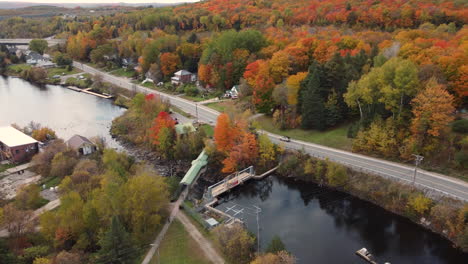 Descending-towards-dam-wall-spillway-at-historical-town-of-Burks-falls-during-autumn