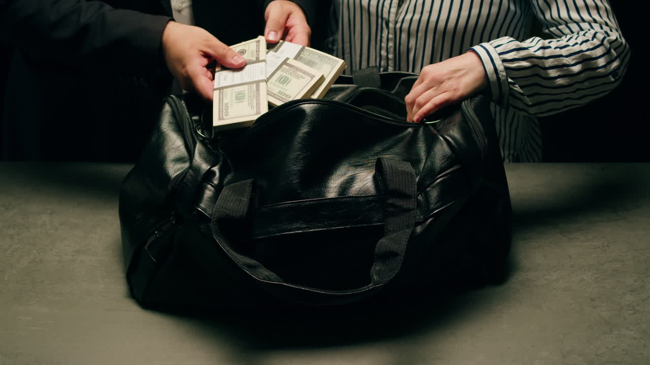 Specialised police officer Counting dollar banknotes in crime lab, conceptual image. High quality 4k footage