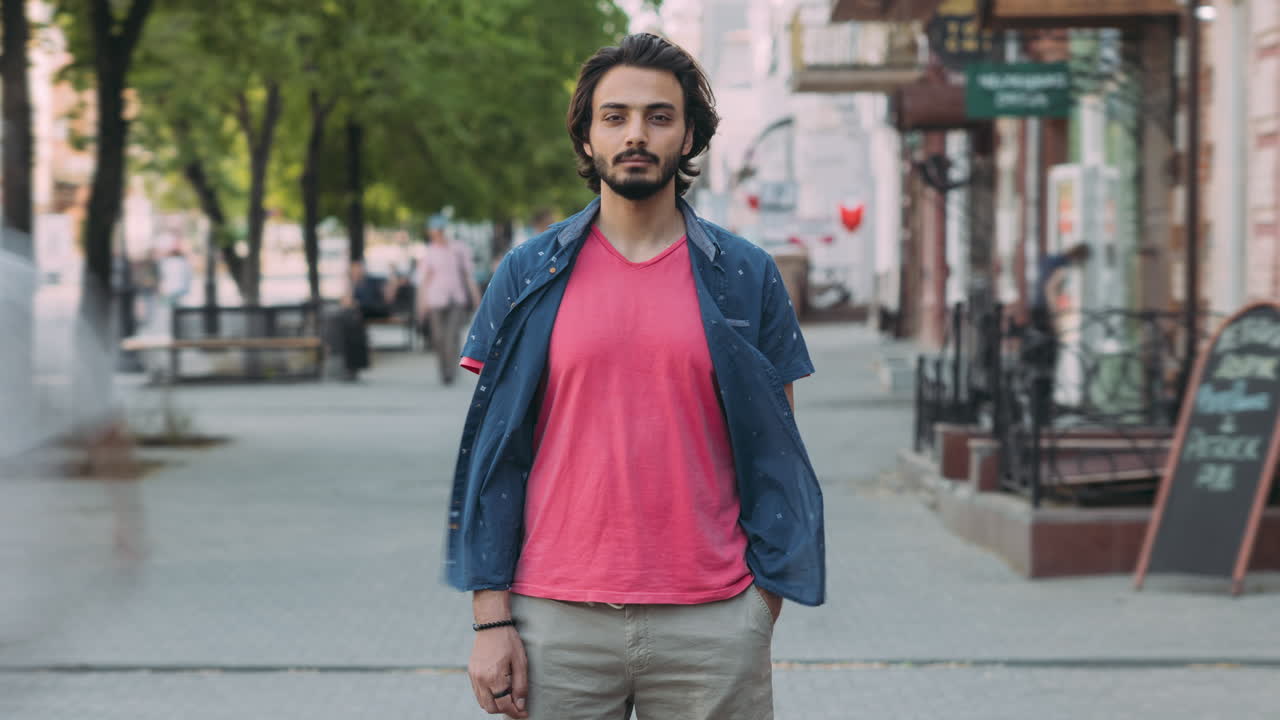 Man standing on city street