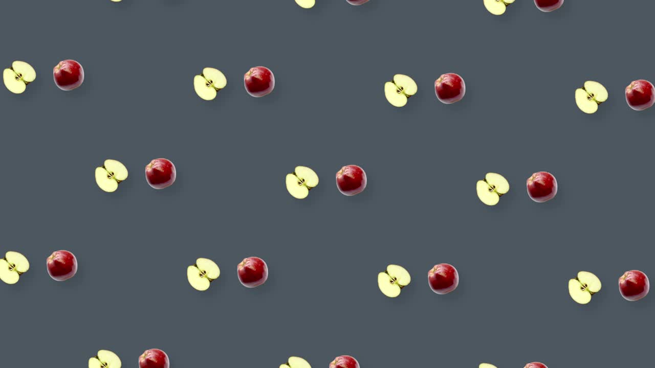 Colorful pattern of fresh rotating apples. Top view. Seamless pattern with apple. Pop art design. Realistic animation. 4K video motion