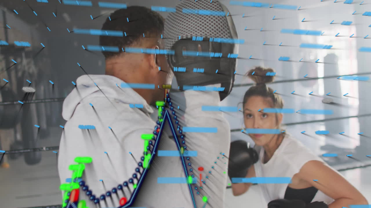 Boxing training session with data analysis animation overlaying athletes in gym